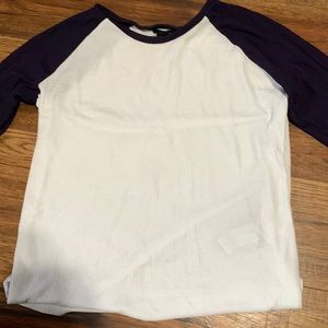 white and navy blue long sleeve shirt